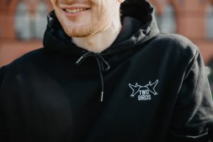 Two Birds Embroidered Black Hoodie Close Up
